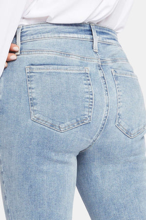 Click here to shop women's light wash jeans