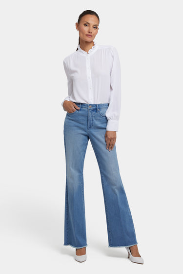 NYDJ Ava Flared Jeans With High Rise And Frayed Hems - Vendome Water