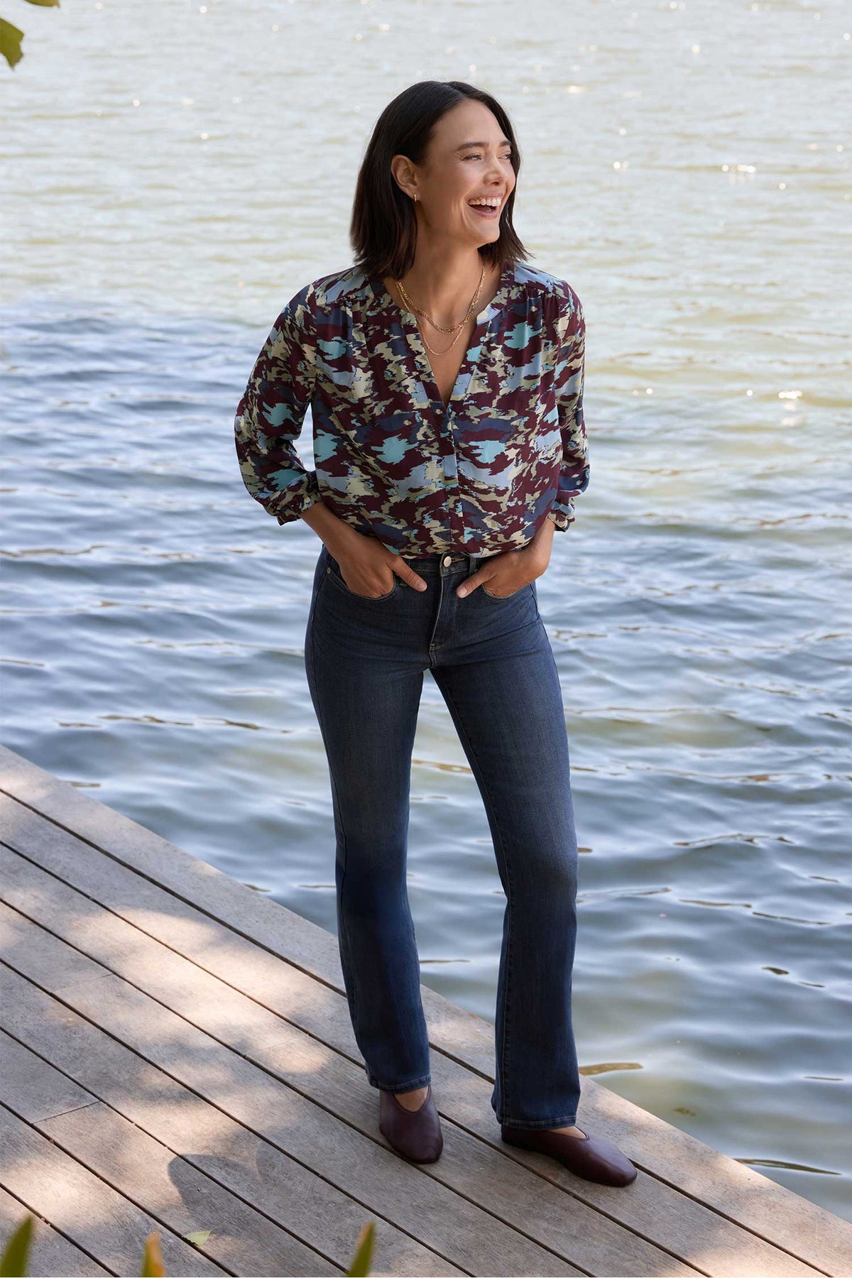Dark Wash Barbara Bootcut Jeans - Styled Lifestyle Shot, Full-Length Front on Dock | NYDJ Apparel